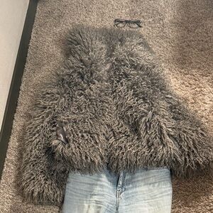Gray Faux Fur Jacket and Light Blue Jeans
